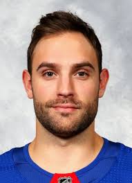 Player photos for the 2010-11 Soo Greyhounds at hockeydb.com