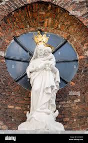 White statue mother mary on hi-res ...