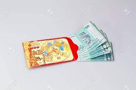 It is subdivided into 100 sen. Malaysian Ringgit Banknote Halfway In Red Packet Angpau For Chinese Stock Photo Picture And Royalty Free Image Image 12018746