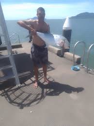 Nathan boslem with a queenfish