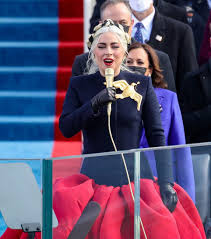 Lady gaga took to the presidential podium this morning to sing the american national anthem. Can We Take A Minute To Appreciate Lady Gaga And Her Hunger Games Vibes For The 2020 Inauguration A Much Appreciated F You Trump On Behalf Of Most Of The Nation Twoxchromosomes