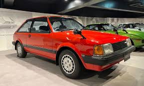 Image result for Mars Red 1965 Mazda