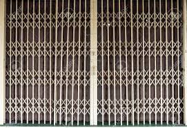 Sealed stainless steel ball bearing rollers make the series 600 durable and easy to operate. Metal Grille Sliding Door Against A Metal Folding Door For Textural Stock Photo Picture And Royalty Free Image Image 15825422