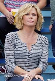Christine has over 23 years of hair styling and coloring experience. Claire S Grey Striped Henley Tee On Modern Family Julie Bowen Hair Family Haircut Julie Bowen Haircut