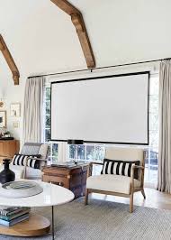 Most diy projects are easy to do and do not cost much money. Our New Hidden Living Room Projector System Emily Henderson