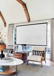 Most diy projects are easy to do and do not cost much money. Our New Hidden Living Room Projector System Emily Henderson