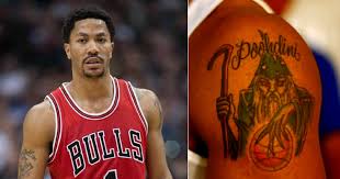 It's decorated like a christmas tree with ornaments like a baby's face, chinese calligraphy, an angel, and the star of david. Monta Ellis Chest Tattoo Arm Tattoo Sites