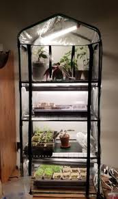 We've got some instructions for small diy greenhouses for you! Diy Portable Indoor Greenhouse And Tips So Easily Distracted