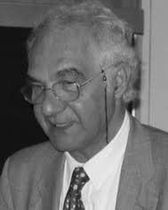 Achievements and open questions in the self- reproduction of vesicles and  synthetic minimal cells