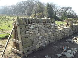 Building a dry stone wall. Clive Elsdon Passes Lantra Level 2 Dry Stone Walling Association Intermediate Level In Dry Stone Walling Today Clive Elsdon Building Design