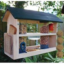 Backyard Bird Feeding Station Ideas Gorgeous 7 Bird Feeding Station Ideas That Many Birds Come Into Your Garden Bird Feeding Station Garden Bird Feeders Bird Feeder Station