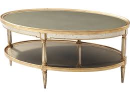 Midcentury oval coffee tables fashioned from wood strike a nice balance, as they'll add warmth to the room without feeling overbearing. Theodore Alexander Acacia Glass Brass 48 Wide Oval Coffee Table Tal5152005