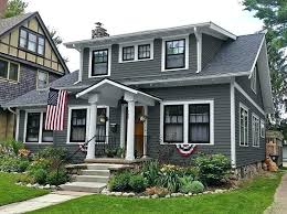 The neutral green siding brings a subtle touch of color without competing with the. Black And Grey House Gray House White Trim Black Shutters Black Windows House Paint Exterior Exterior House Paint Color Combinations Modern Farmhouse Exterior