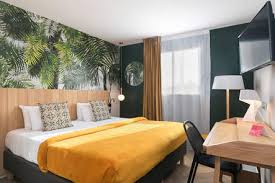 Internet, air climatisé, télévision, satellite ou câble, non fumeurs, chaufferette capacité : Hotel Toulouse Dans Le Centre