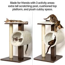 It has a circular house made from banana leaf material, which sits atop a sturdy wood tripod base. Cat Scratching Post Modern Www Macj Com Br