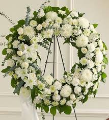 Since the ancient greeks first started leaving asphodel on the graves of their departed loved ones, there has been a continuous record of funeral flowers you can draw on. Serene Green Conroy S Flowers Cypress Flower Wreath Funeral Funeral Flowers Funeral Flower Arrangements
