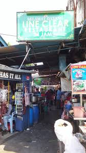 Line clear nasi kandar is located in an alleyway which is very easy to miss.if you're walking from lebuh chulia, keep to the left hand side and you should see the above yellow signboard on the walkway once you turn left onto jalan penang. Line Clear Nasi Kandar Jalan Penang Georgetown Penang Spring Tomorrow