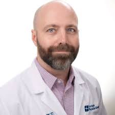 Dr. Adam Hunzeker, MD