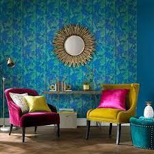 Living rooms are where we all go to relax and unwind, and with all the stress of 2020, i think our senses will need some extra tlc next year! with so many unable to travel this year, memories of trips and wanderlust will be front and center in the 2021 living room, anwar notes. Ubud Wallpaper In Tropic From The Exclusives Collection By Graham Br In 2021 Palm Wallpaper Green Wallpaper Wallpaper Living Room