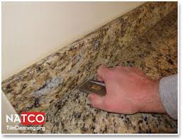 How do i clean this off and get a nice smooth surface again? Professional Recaulking Procedure For Granite Countertops Granite Countertops Countertops How To Remove Caulking