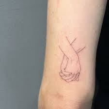 Getting a hand tattoo is a huge commitment. Tinytattoo Tattooforguys Hand Tattoos Small Hand Tattoos Hand Holding Tattoo