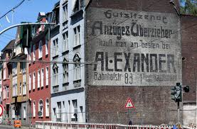 Old refineries have been remodelled into event halls and ice skating rinks. German Wall Hid 110 Year Old Jewish Biz Mural The Jewish Star Www Thejewishstar Com