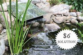 Consider making a small auxiliary pond in this mound. How To Hide A Pond Waterfall Spillway Box