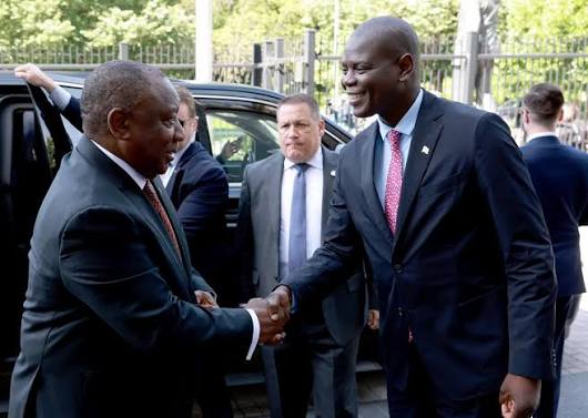 President Cyril Ramaphosa welcomed by International Relations and  Cooperation Minister, Mr Ronald Lamola upon his arrival at the South  African Embassy in Washington DC, USA. President Ramaphosa held a  preparatory meeting with