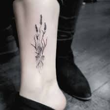 Stella Luo Creates Mesmerizing Minimalist Tattoos Tattoos Lavender Tattoo Small Feminine Tattoos
