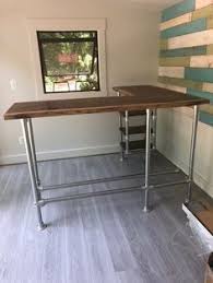 A drill/driver is the only tool you really need, but a pipe wrench comes in handy for tightening all of the pieces. Pipe Desks