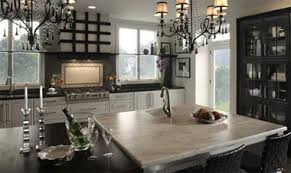 This kitchen features contrasting countertop colors and collections with dupont® corian® witch hazel on the island and dupont® zodiaq make sure you are comfortable with any differences. Top Your Kitchen Island With A Custom Countertop The House Designers