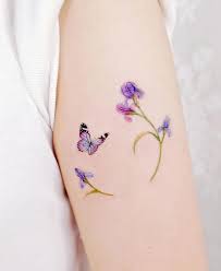 41 Women S Butterfly Tattoo Designs Symbolizing Freedom Keep Creating Beauty And Warm Home Find More Happiness In Daily Life In 2020 Butterfly Tattoos For Women Iris Tattoo Purple Butterfly Tattoo