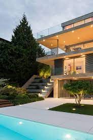 single family residence kilchberg facade glass balustrade garden flagging swimming pool dream house exterior house exterior architecture