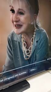 What is the information of the stunning necklace worn by Miss Paula