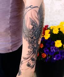 Need some phoenix tattoo inspiration? Phoenix Tattoo Men Forearm Tattoo Designs Ideas