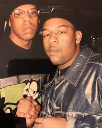Jay-Z with a Felix the Cat shirt and Little Shawn, photographed during  their attendance at a Def Jam Recordings industry party in New York City by  Jim "Flickmaster" Moore