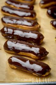 Classic Eclair Is A Pate A Choux Based Hollow Pastry Shell Filled With Creamy Custard Then Dipped Into A C Eclair Recipe Classic Eclair Recipe Dessert Recipes
