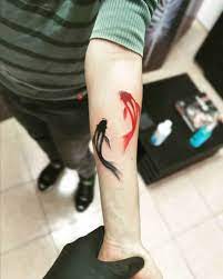 Should A Koi Fish Tattoo Face Up Or Down