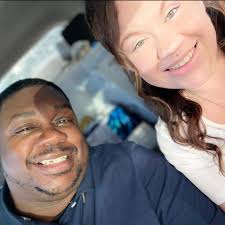 Who makes custom shirts and recommends a makeup artist for a photo shoot?