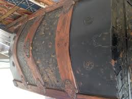 After the water has been absorbed into the old paper use the scrapper to scrape it out. Antique Camel Back Trunk Collectors Weekly