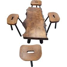 A classy coffee table and 4 nesting stools of wood in browns. Vintage Coffee Table And Set Of 4 Stools Brutalist In Elm France 1960s Design Market