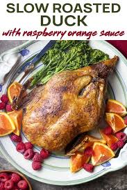 Crispy Slow Roasted Duck Is Served With A Raspberry Orange Port Sauce It S A Simple Yet Impressive Christmas Dinner Recipes Easy Recipes Potato Side Dishes