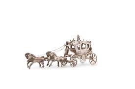 LOT:0 | MINIATURE SILVER A couch and ...