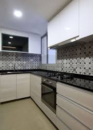 A Stylish Home Filled With Art In Singapore Kitchen Design Small Kitchen Design Cottage Kitchen Cabinets