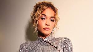 Rita Ora's Sheer Tights And Mini Dress Combo Is A Party Season Must-have