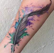 Beautifully detailed tiny arrow with a watercolor feather, tattoo by tattooist flower. 33 Watercolor Feather Tattoos
