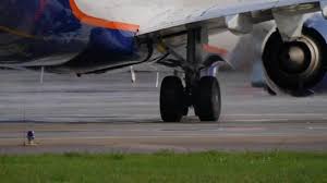 The world's largest twinjet and commonly referred to as the triple seven, it can carry between 283 and 368. Landing Gear Of Boeing 777 Aircraft Turns On Taxiway Jet Engine Makes Heat Haze Stock Video C Readbook 211819752
