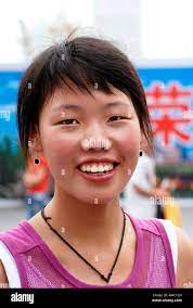 Laughing chinese girl, Shanghai, China, Asia Stock Photo - Alamy