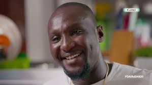 ADELAIDE ABBIW WILLIAMS preparing ACHEKE with Tilapia and Aloko