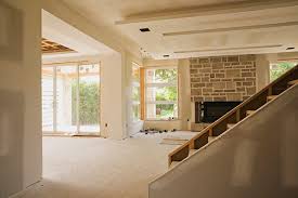 Cut the corner trim to the desired height, then glue the trim into place. How To Finish A Basement On A Budget 8 Tips Geico Living